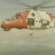 Illustration for article titled Why Is This Mi-24 Hind Wearing U.S. Coast Guard Colors?
